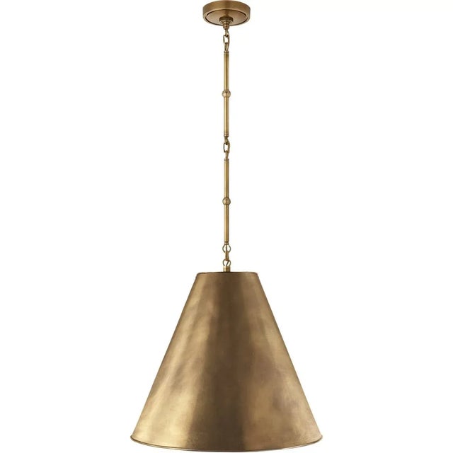 Goodman Medium Hanging Light in Hand-Rubbed Antique Brass with Hand-Rubbed Antique Brass Shade Designer: Thomas O'Brien...