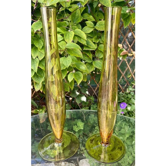 This is a Art Nouveau amber glass vases, also known as a ‘bud vase’. This type of vase is designed to hold a single flower...