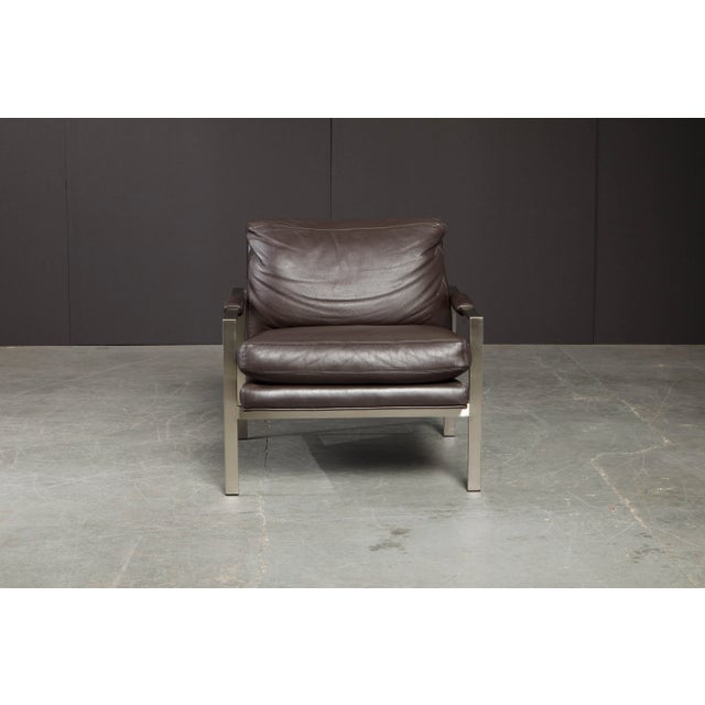 These stylish full-grain leather lounge armchairs are by Milo Baughman for Thayer Coggin, originally designed in 1966,...