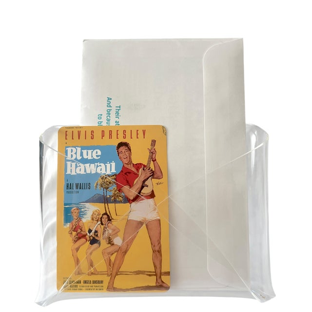 An eye-catching vintage Lucite organizer formed from a single sheet of clear acrylic, folded into an elegant envelope...