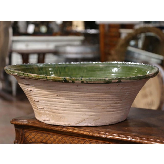 This important antique "Tian" (Provencal term for serving bowl), was crafted in Provence, southern France circa 1780. The...