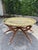 Vintage Folding Moroccan Embossed Brass Tray Coffee Table with Wooden Spider-Leg Base and Brass Metal Feet. Unmarked. In...