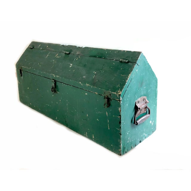 Ideal for an accent item in the farmhouse style home, this handmade rustic industrial wood trunk/toolbox features the...