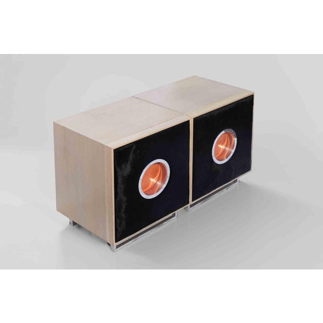 Pair of Roberto Cavalli Pony Skin Chests of Drawers. Italy, 2000s. A striking and highly decorative pair of chests of...