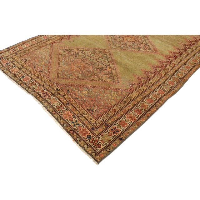 53062 Antique Persian Malayer Runner with Rustic Mediterranean Style 04'01 x 09'01. This hand-knotted wool and camel hair...