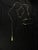 A versatile plug-in swag pendant light with a long hanging chain and pull-chain socket, offering a clean blend of...