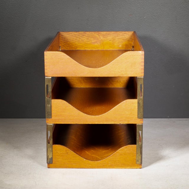 ABOUT An antique wooden three-tier office tray constructed with exposed dovetail joinery and sculpted, wave-cut fronts and...