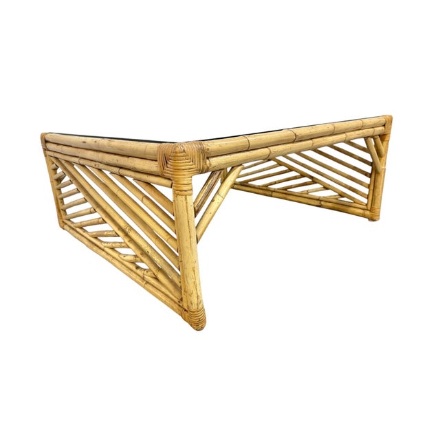 Bring relaxed, coastal charm to your space with this vintage circa 1970's bamboo square coffee table. Featuring a...
