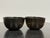 Design Plus Gallery presents a pair of Japanese Lacquer Dragon Bowls. Each bowl has a rounded form with a black lacquered...