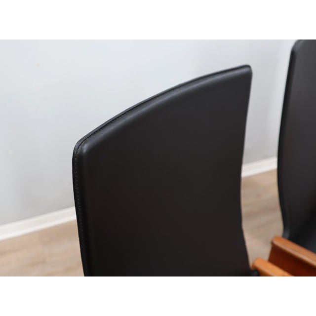 A quintessential example of italian mid-century modern furniture, this exceptional set of four "segesta" chairs, conceived...