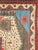 A vintage Turkish Anatolian pictorial rug from the mid-20th century. A self-taught artist has depicted six buildings and...