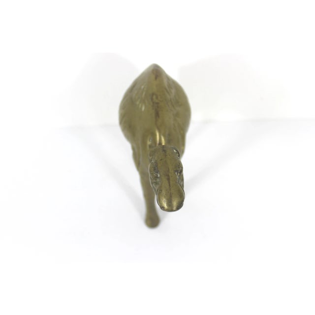 Large, heavy solid brass camel with some lovely patina. What’s not to love? Dimensions: 7” tall 8” long 3” wide