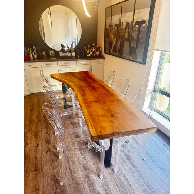 7’ long with an organic depth from 34” to 24”. Handcrafted live edge wood top with custom matte black metal legs, designed...