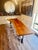 7’ long with an organic depth from 34” to 24”. Handcrafted live edge wood top with custom matte black metal legs, designed...