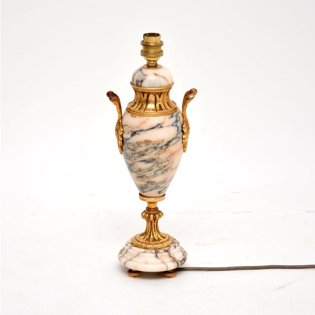 A beautiful antique French marble and gilt bronze table lamp. This was made in France, it dates from around the 1890-1910...