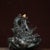 This is a finely cast antique gilt bronze backflow incense burner featuring a dynamic dragon motif. The piece is designed...