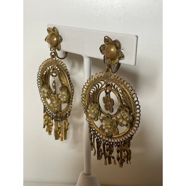 This is part of Chairish’s Costume Jewelry assortment. Gorgeous Art Nouveau Filigree Earrings from the 1920s. Excellent...