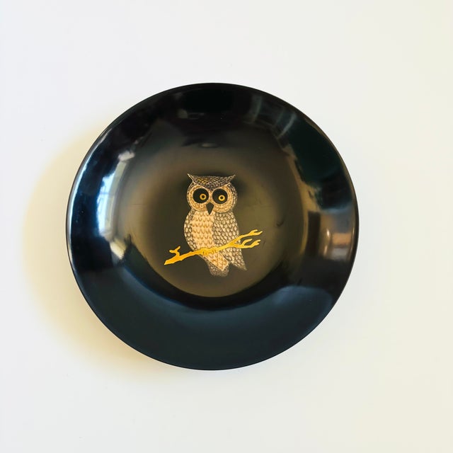 A wonderful vintage circular tray. The image of an owl in the center of the dish is formed from small pieces of inlaid...