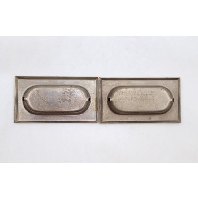 Classic style nickel plated brass rectangular recessed window sash lifts. The original mounting screws are not available....