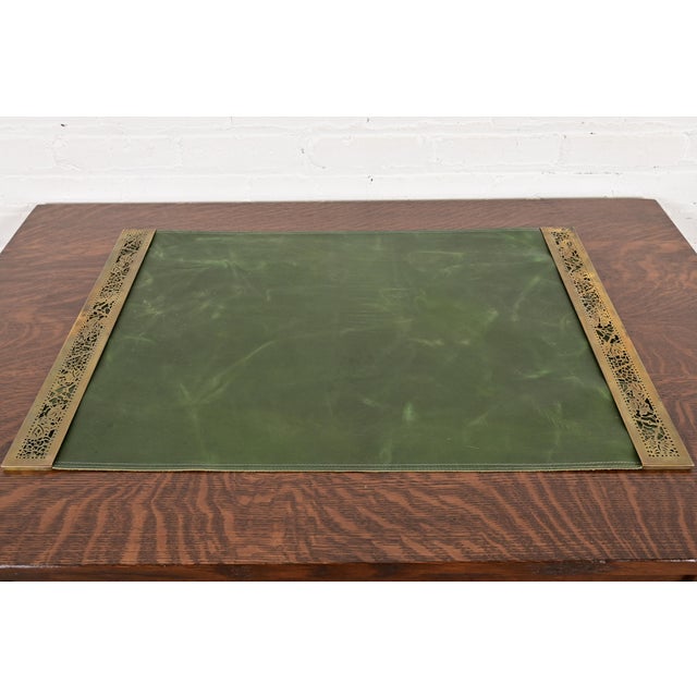 A gorgeous pair of Art Deco or Arts & Crafts period bronze "Grapevine" pattern blotter ends with a custom green leather...