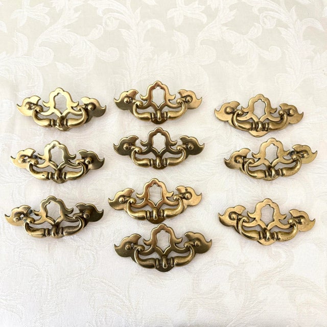 Beautifully detailed drawer pulls, attributed to Keeler Brass Co., Grand Rapids, MI. These elegant batwing-style handles...