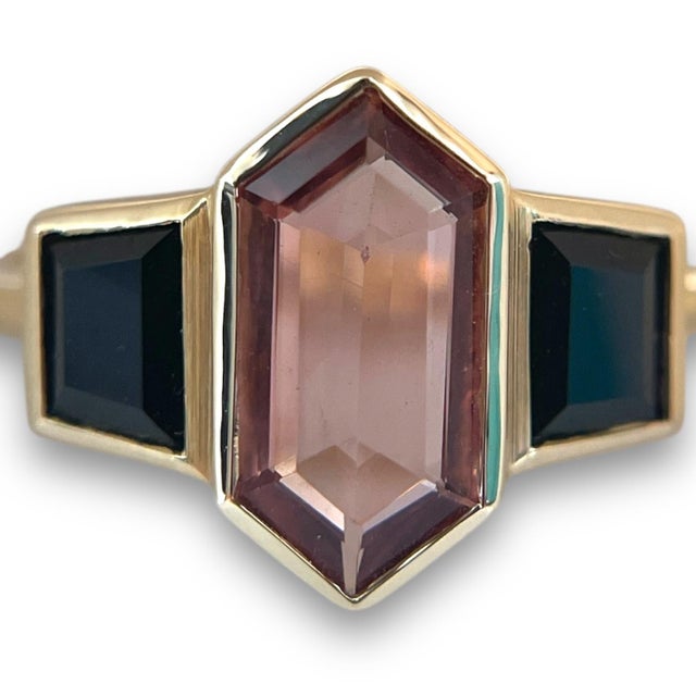 Material: 14k Yellow Gold Stone: Rubellite Tourmaline Condition: Excellent Caret Weight: Tourmaline: 1.07ct , Black...
