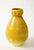 A ceramic vase in a beautiful glaze of a golden yellow produced by Accolay Pottery. Founded in the 1950s in Accolay,...