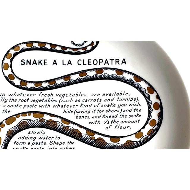 Fornasetti Fleming Joffe Recipe Plate, Snake a la Cleopatra Italy, 1960s–1974 A snake winds four times around this plate...