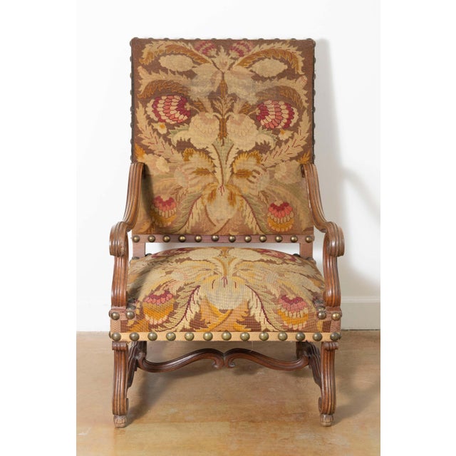 This 19th-century French armchair showcases the elegance and craftsmanship of its era, making it a timeless statement...