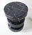 This is easily a side table or a stool. A very heavy carved stool designed by Kelly Wearstler and labeled. It weighs in at...