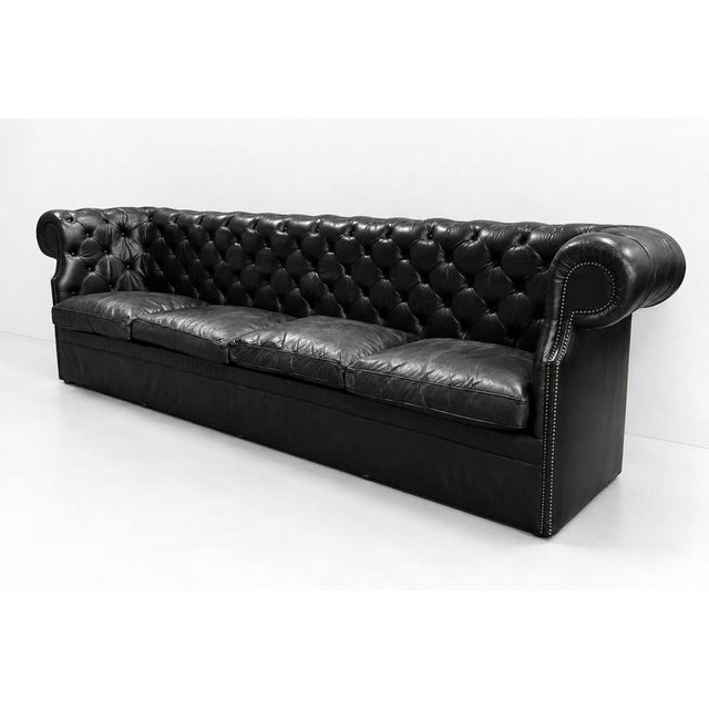 Step back in time with this exquisite 1980’s Vintage Chesterfield style sofa, a true embodiment of elegance and...