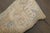 a pillow made from an early 20th Century Afghan ersari Rug. 14'' x 30'' polyfill insert provided