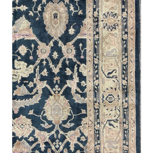 Keivan Woven Arts, En-140898, kwarugs. This Turkish rug contains subtle tones of light pink, lavender, and cream, which...