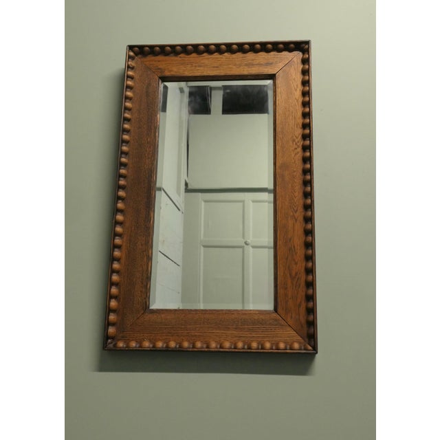 Victorian Carved Golden Oak Wall Mirror The Bevelled Mirror is set in a 5” wide carved frame Both the mirror and the frame...