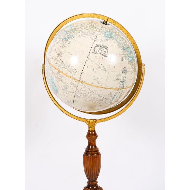A vintage 18 inch cram's imperial world globe on stand by george f. Cram company inc usa late 20th century in date. The...