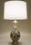 A sculpturally sensual hand blown controlled "Mosaic" Millefiori Art Glass and Brass table lamp designed and manufactured...