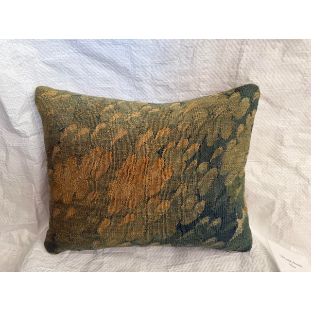 This authentic Antique 17th Century Brussels Tapestry Pillow is handcrafted from an original Brussels tapestry dating to...