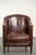This subtle sheepskin armchair features beautiful deep brown colors and is finished with black piping. The armchair has a...