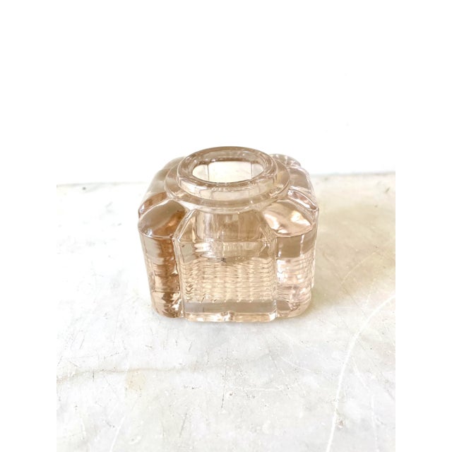 Lovely inkwell glass in holder. A beautiful pale rose color glass.
