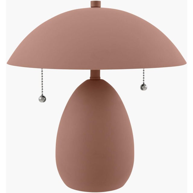 Illuminate your space with the charming allure of the Umberis accent table lamp, a perfect embodiment of traditional...
