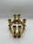 A sculptural vintage Dirilyte candelabra set with a warm gold tone finish and a beautifully architectural presence....