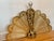 Oversized antique Victorian brass peacock fireplace screen which stands 48" wide when open. Adorned with classical motif....