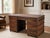 Brown British Colonial Faux Luggage Campaign-Style Kneehole Desk For Sale - Image 8 of 8