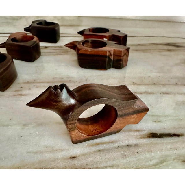Set of six vintage exotic wood from hand carved in the shape of a bird and elephant napkin holders.