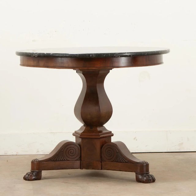 Dimensions: 28 ½” H x 32” W x 32” D A gorgeous French marble-top gueridon table from the Restauration period (mid 19th...