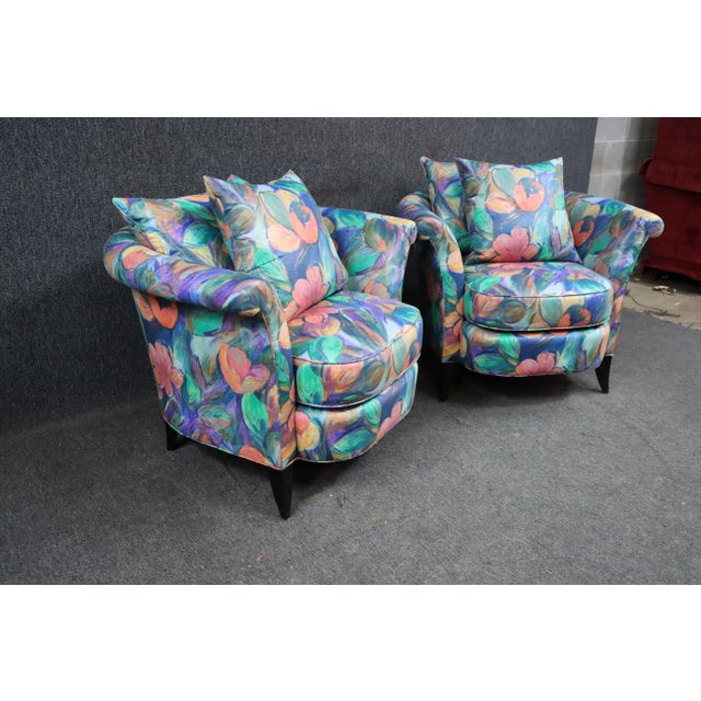 A pair of modern club chairs by Swaim furniture in bold silk upholstery with down cushions.
