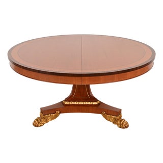 1980s Baker Furniture Regency Cherry Wood and Parcel Gilt Paw Foot Pedestal Extension Dining Table, Newly Refinished For Sale
