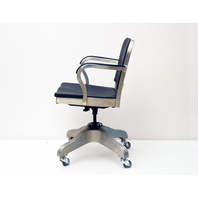 Gio Ponti office armchair designed for the Montecatini S.A. offices in Milan in 1938. Luxury model covered in leather with...