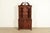 A beautiful Chippendale or Georgian style lighted breakfront bookcase or dining cabinet In the manner of Baker Furniture...