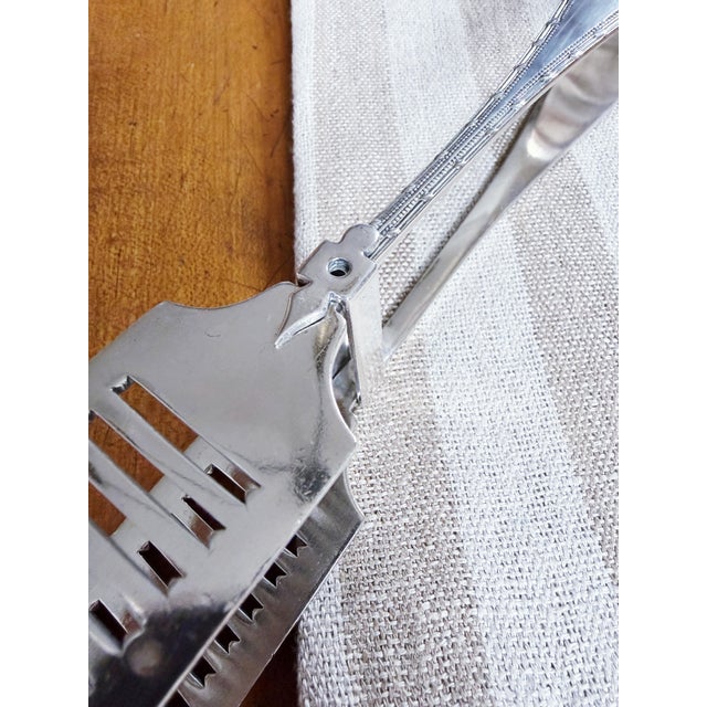 A stunning antique circa 1920s silver plated asparagus tongs from a Ritz Carlton hotel. In excellent condition, no damage...